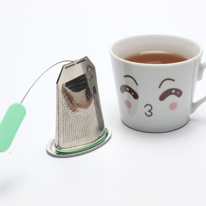 Stainless steel tea bag infuser with long wire handle and silicone tip and s/s drip tray