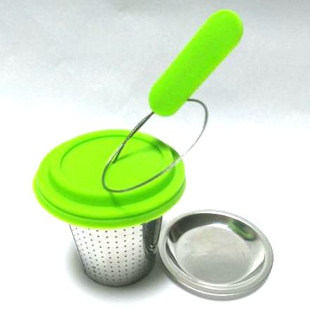 Large capacity basket tea infuser with etched fine fine holes and long wire handle and stainless steel drip tray